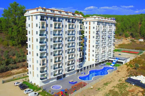 Brand new 1+1 apartment for sale in a luxury complex intertwined with nature