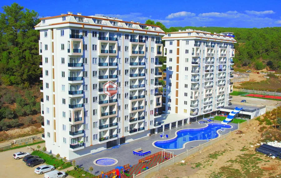 Brand new 1+1 apartment for sale in a luxury complex intertwined with nature