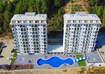 Prodaje se potpuno nov stan 1+1 u luksuznom kompleksu isprepletenom prirodom