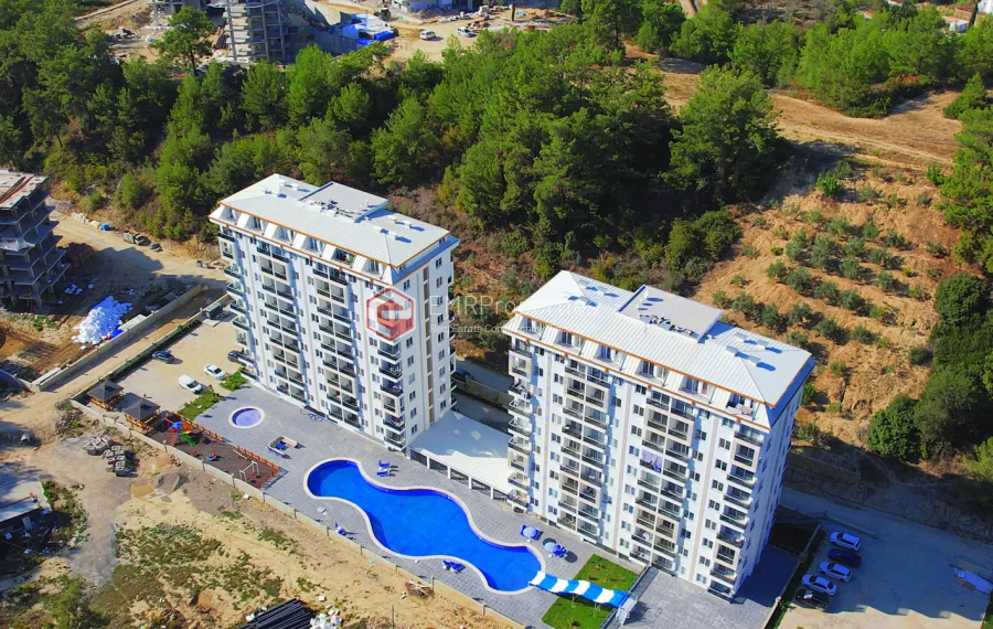 Brand new 1+1 apartment for sale in a luxury complex intertwined with nature