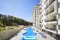Brand new 1+1 apartment for sale in a luxury complex intertwined with nature