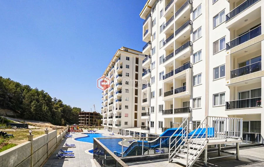 Brand new 1+1 apartment for sale in a luxury complex intertwined with nature