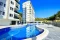 Brand new 1+1 apartment for sale in a luxury complex intertwined with nature