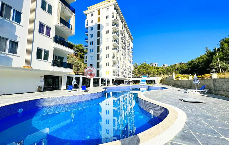 Brand new 1+1 apartment for sale in a luxury complex intertwined with nature