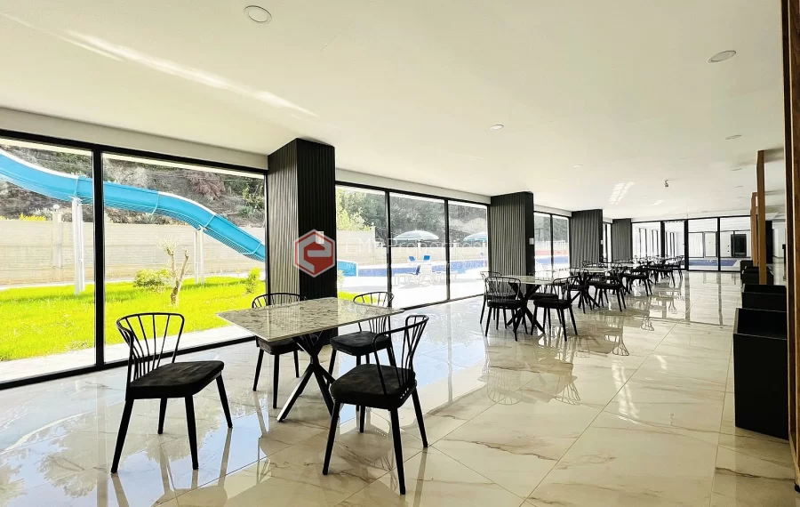 Brand new 1+1 apartment for sale in a luxury complex intertwined with nature