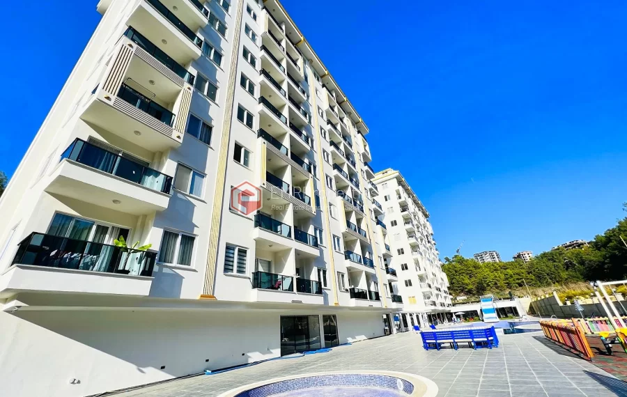 Brand new 1+1 apartment for sale in a luxury complex intertwined with nature