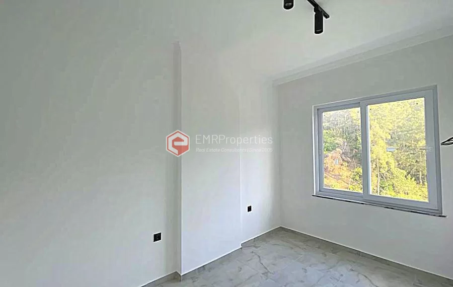 Brand new 1+1 apartment for sale in a luxury complex intertwined with nature