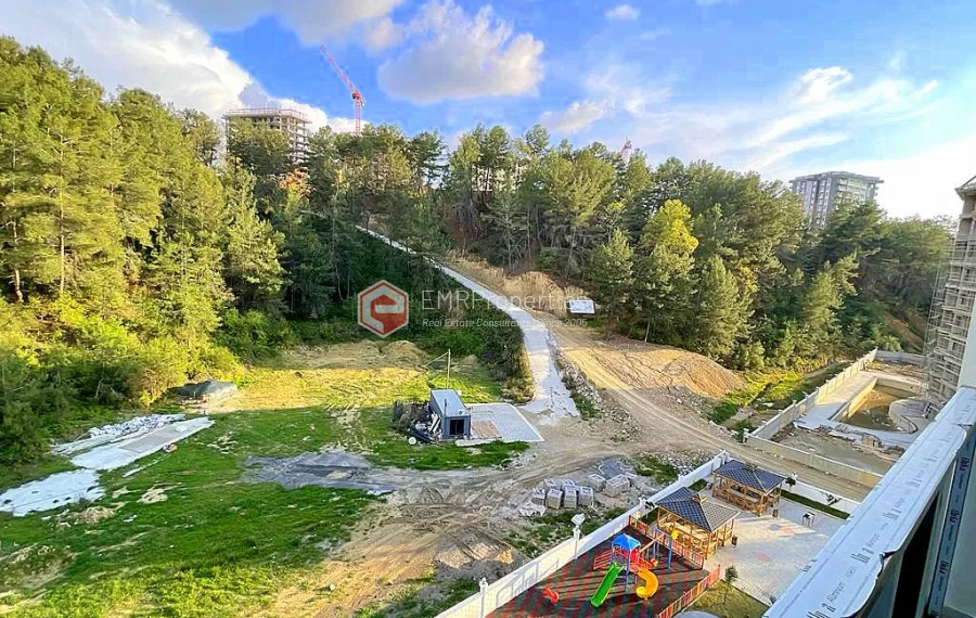 Brand new 1+1 apartment for sale in a luxury complex intertwined with nature