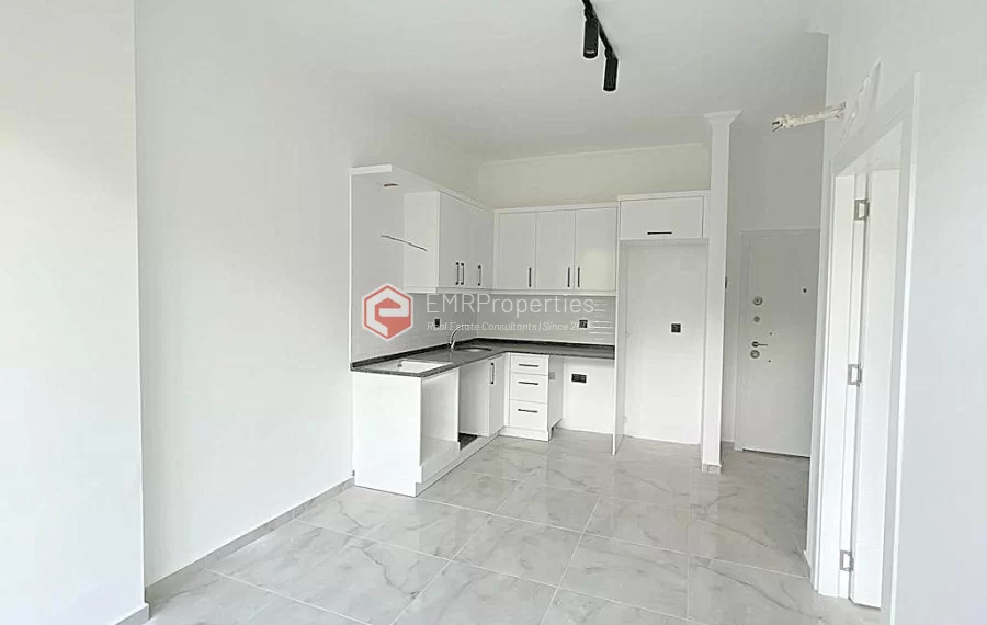 Brand new 1+1 apartment for sale in a luxury complex intertwined with nature