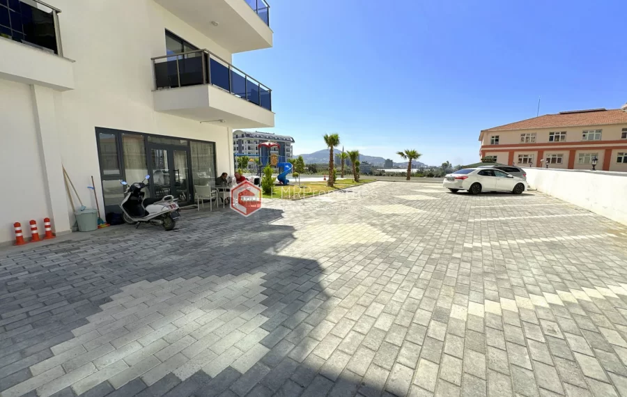 Modern apartment with sea view for sale in Mahmutlar