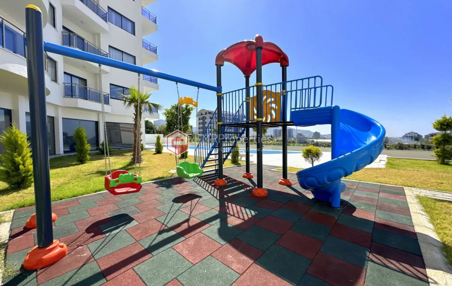 Modern apartment with sea view for sale in Mahmutlar