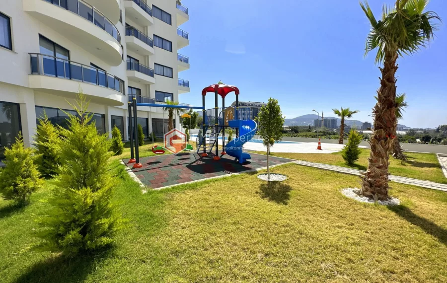 Modern apartment with sea view for sale in Mahmutlar
