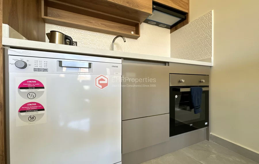 Modern apartment with sea view for sale in Mahmutlar