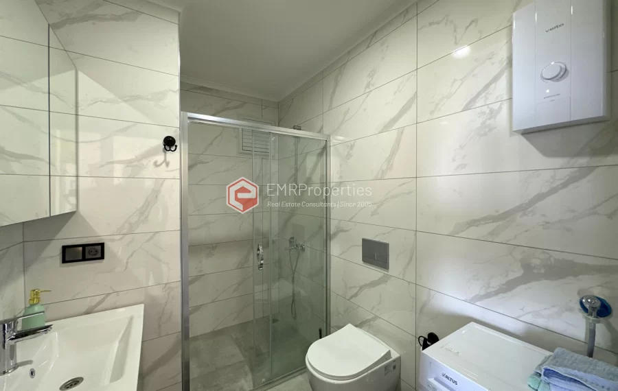 Modern apartment with sea view for sale in Mahmutlar