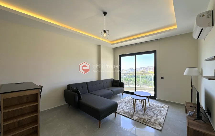 Modern apartment with sea view for sale in Mahmutlar