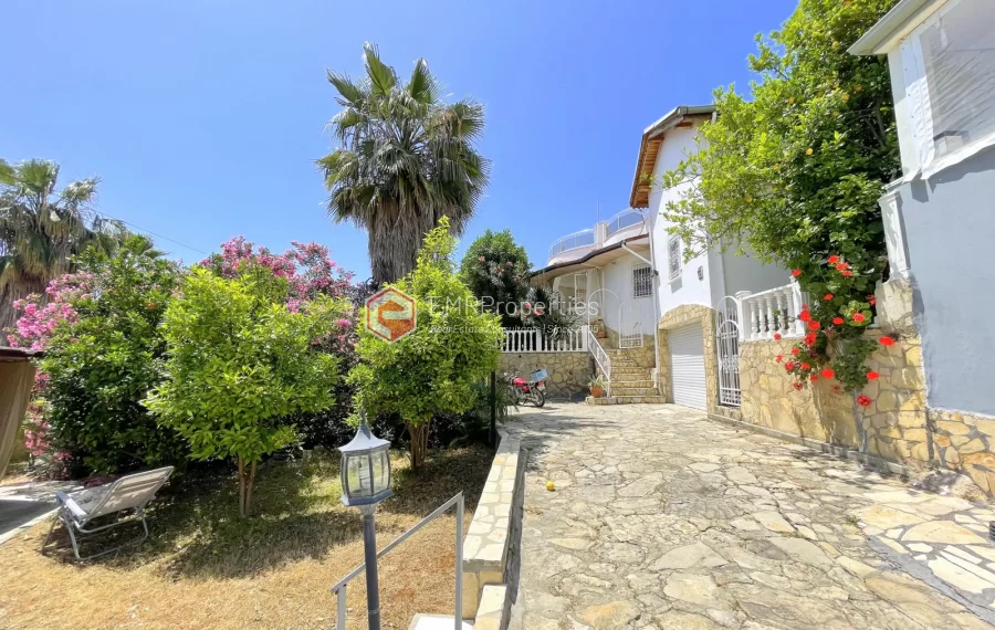 Affordable detached villa with large garden and terrace for sale in Turkler