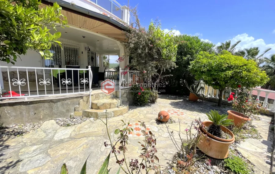 Affordable detached villa with large garden and terrace for sale in Turkler