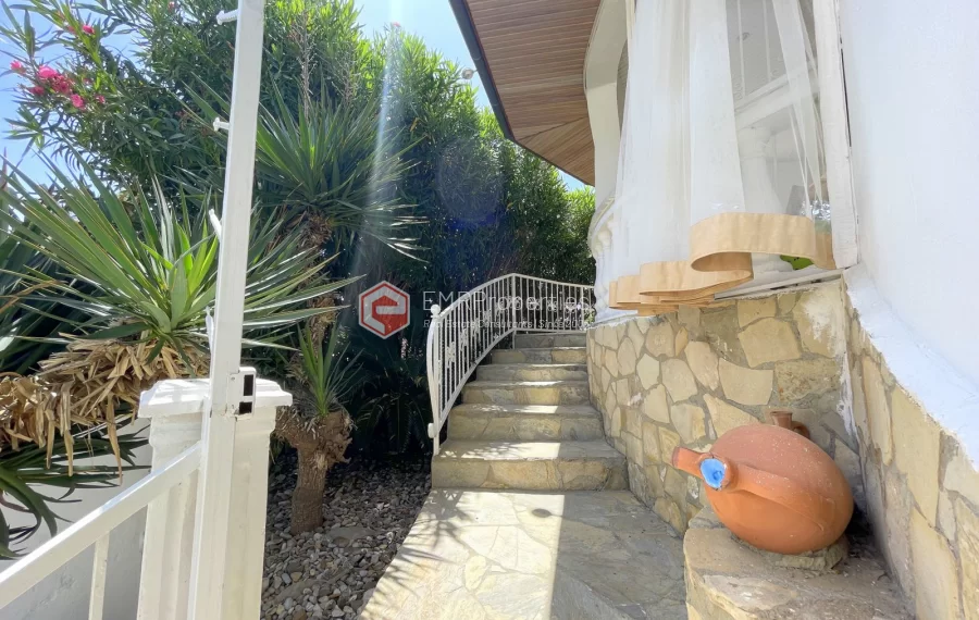 Affordable detached villa with large garden and terrace for sale in Turkler