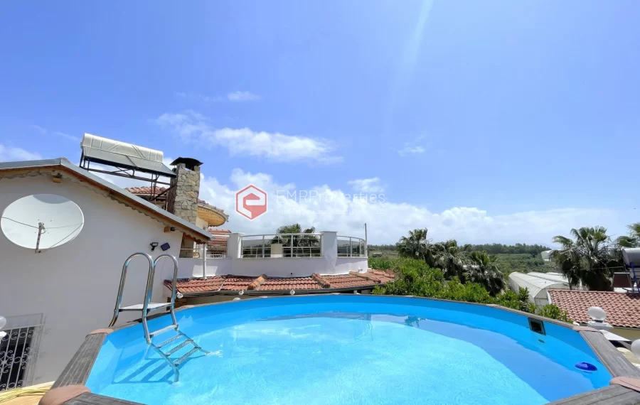 Affordable detached villa with large garden and terrace for sale in Turkler