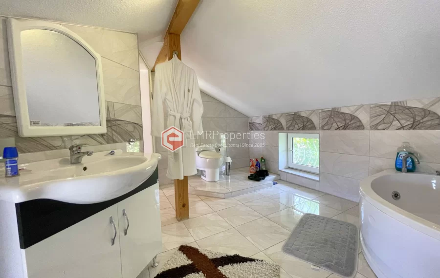 Affordable detached villa with large garden and terrace for sale in Turkler