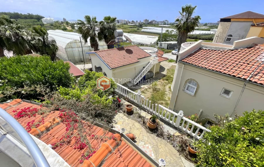 Affordable detached villa with large garden and terrace for sale in Turkler