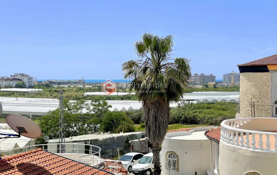 Affordable detached villa with large garden and terrace for sale in Turkler