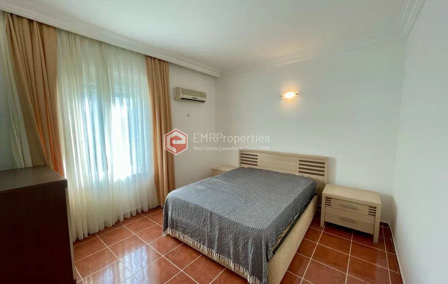 Просторная квартира с видом на бассейн в Каргыджак, Аланья