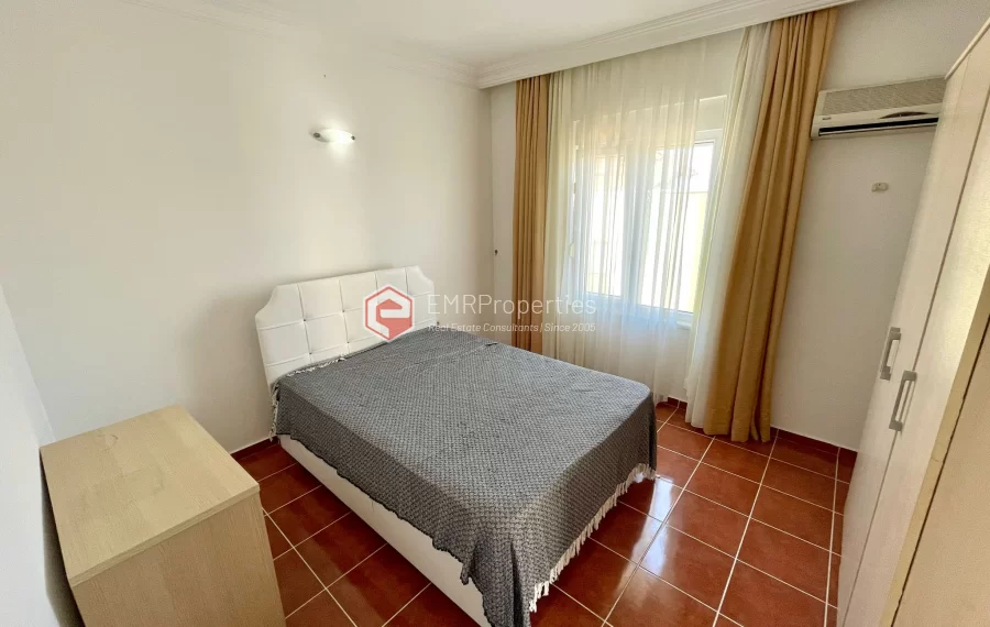 Просторная квартира с видом на бассейн в Каргыджак, Аланья