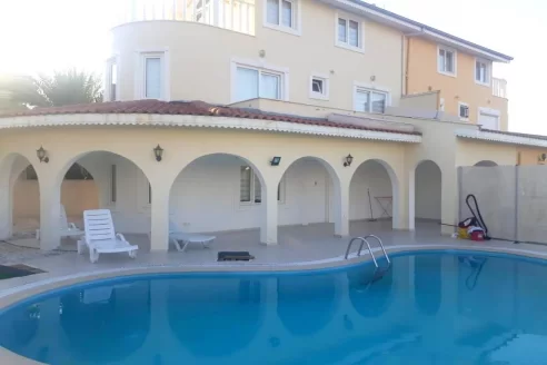 Lovely 3-bedroom triplex twin villa for sale in the golf center in Antalya