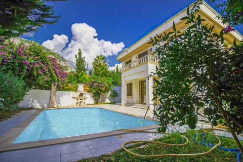 Detached triplex villa with private pool for sale in Kemer