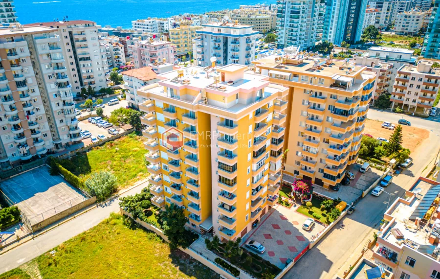 Пентхаус-дуплекс с 4 спальнями и видом на море на продажу в Махмутларе