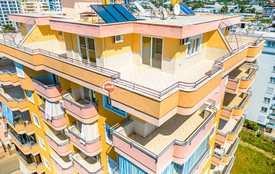 Пентхаус-дуплекс с 4 спальнями и видом на море на продажу в Махмутларе