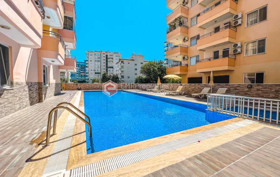 Пентхаус-дуплекс с 4 спальнями и видом на море на продажу в Махмутларе