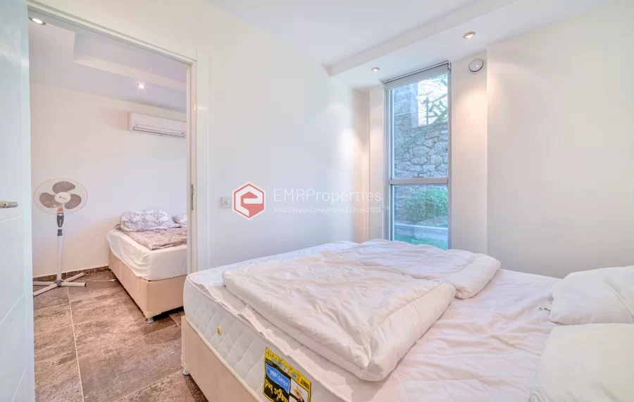 Просторная 4-х спальная квартира с видом на море на продажу в Джикджилли Аланья