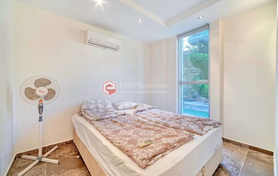 Просторная 4-х спальная квартира с видом на море на продажу в Джикджилли Аланья