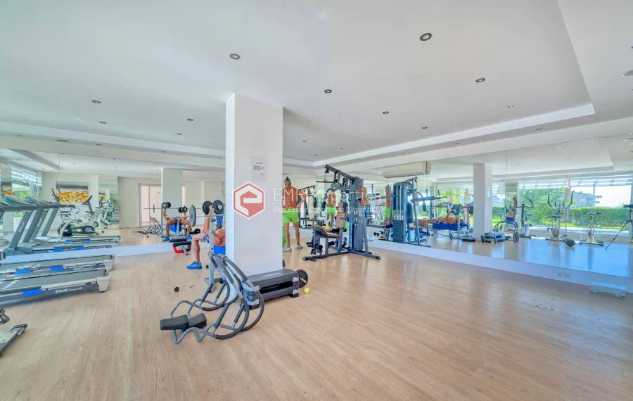 Просторная 4-х спальная квартира с видом на море на продажу в Джикджилли Аланья