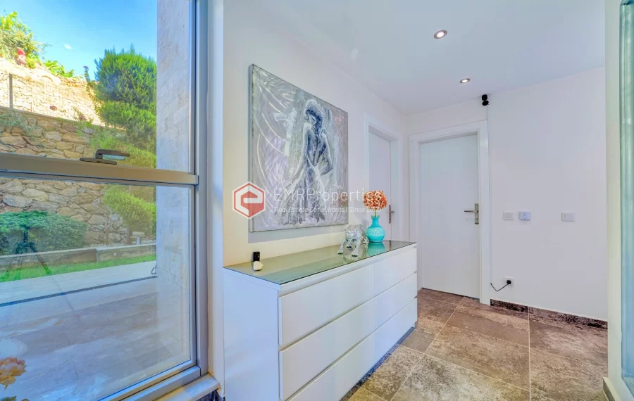 Просторная 4-х спальная квартира с видом на море на продажу в Джикджилли Аланья