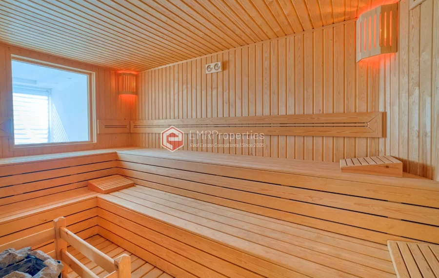 Просторная 4-х спальная квартира с видом на море на продажу в Джикджилли Аланья