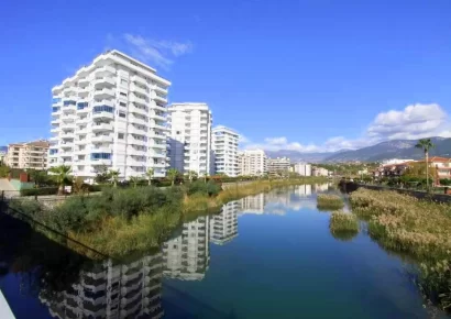 Wunderschöne 3 Zimmer Wohnung am Meer zum Verkauf in Tosmur Alanya