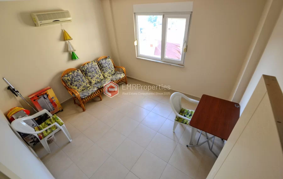 Продается современная 2-комнатная квартира с видом на море и замок в Джикджилли.