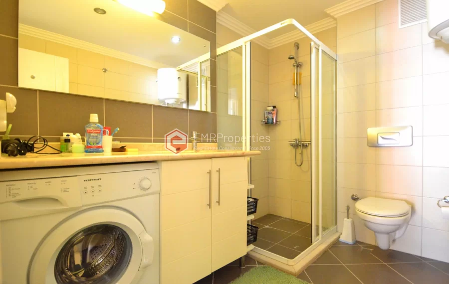 Продается современная 2-комнатная квартира с видом на море и замок в Джикджилли.