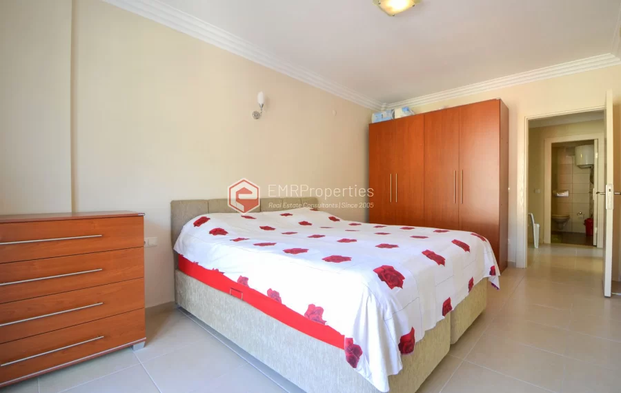 Продается современная 2-комнатная квартира с видом на море и замок в Джикджилли.