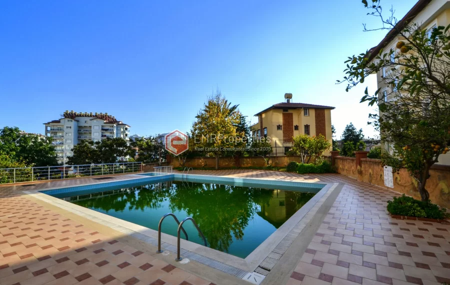 Продается современная 2-комнатная квартира с видом на море и замок в Джикджилли.