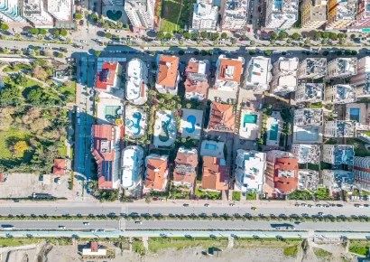 Продается двухуровневый пентхаус на первой линии моря с видом на море и крепость в Махмутларе