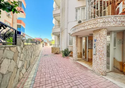 Продается двухуровневый пентхаус на первой линии моря с видом на море и крепость в Махмутларе